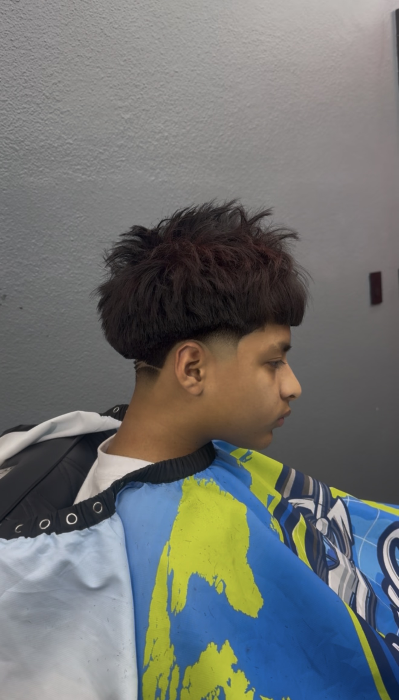 Textured top with clean fade side profile